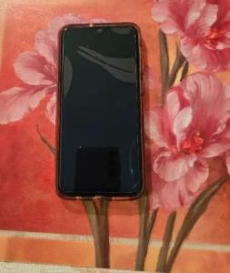 Samsung A50 phone with case, protective cover and charger