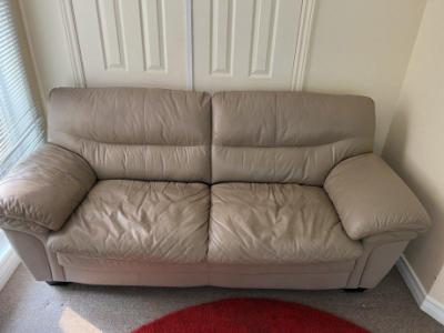 Light brown leather loveseat