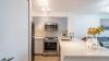 CONDO SALE-> 1+1 BR, Den, Parking, Furniture, all Utilities !!