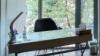 Glossy white desk with chrome legs